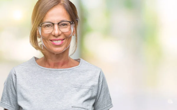 Middelbare Leeftijd Senior Spaanse Vrouw Bril Geïsoleerde Achtergrond Met Een — Stockfoto