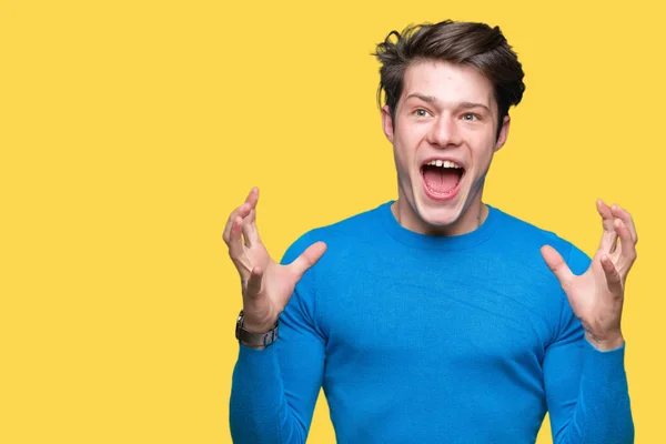 Homem Bonito Jovem Vestindo Camisola Azul Sobre Fundo Isolado Louco — Fotografia de Stock