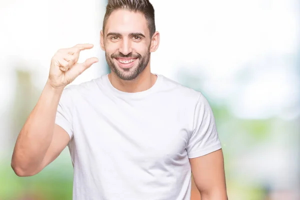 Hombre Joven Que Usa Una Camiseta Blanca Casual Sobre Fondo —  Fotos de Stock