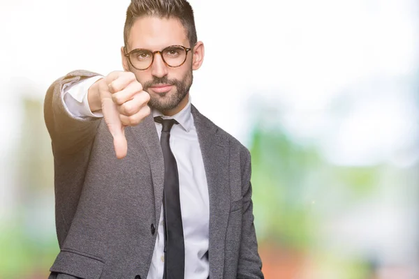 Joven Hombre Negocios Guapo Sobre Fondo Aislado Buscando Infeliz Enojado —  Fotos de Stock