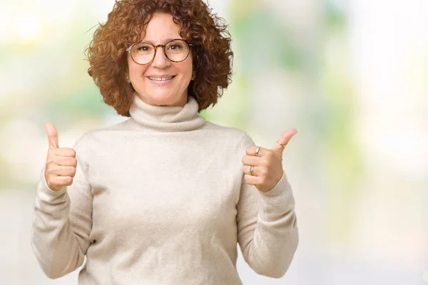 Schöne Seniorin Mittleren Alters Rollkragenpullover Und Brille Über Isoliertem Hintergrund — Stockfoto