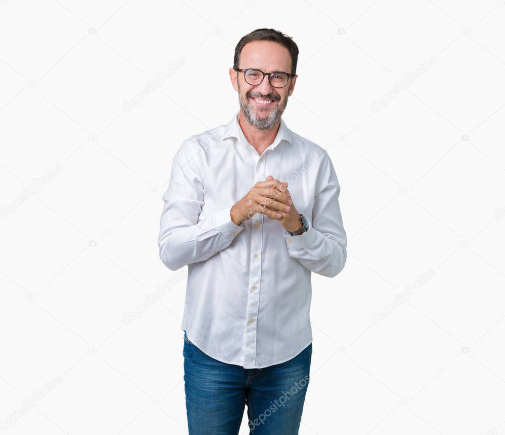Handsome middle age elegant senior business man wearing glasses over isolated background Hands together and fingers crossed smiling relaxed and cheerful. Success and optimistic