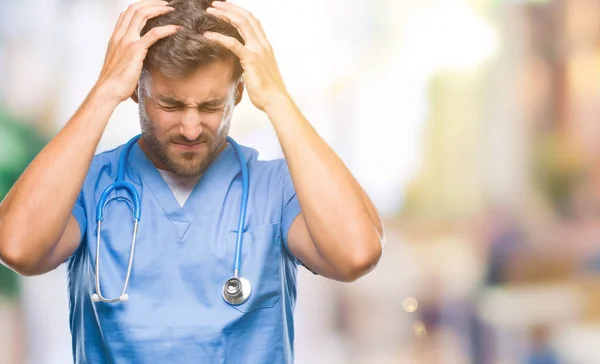 Young Handsome Doctor Surgeon Man Isolated Background Suffering Headache Desperate — Stock Photo, Image