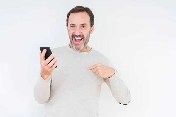 Senior Man Using Smartphone Isolated Background Surprise Face Pointing Finger — Stock Photo, Image