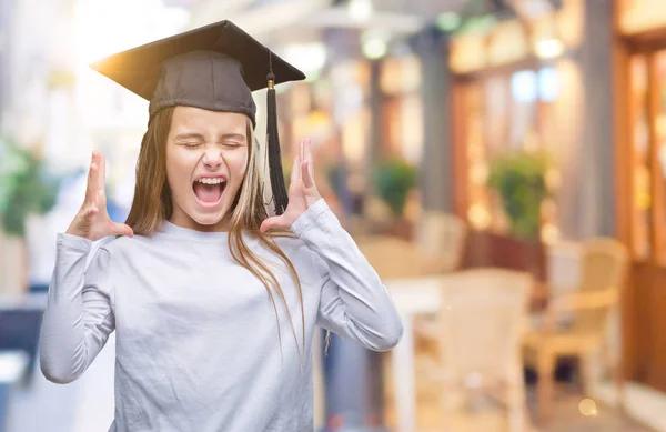 Young Beautiful Girl Wearing Graduate Cap Isolated Background Celebrating Mad — Stock Photo, Image