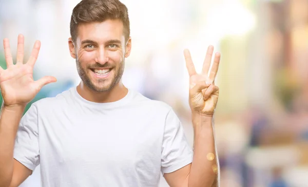 Young Handsome Man Isolated Background Showing Pointing Fingers Number Eight — Stock Photo, Image