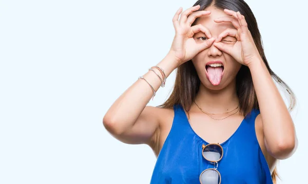 Young Asian Woman Isolated Background Doing Gesture Binoculars Sticking Tongue — Stock Photo, Image