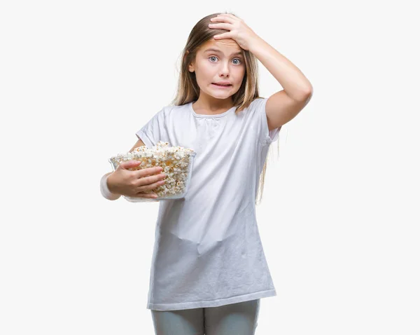 Young Beautiful Girl Eating Popcorn Snack Isolated Background Stressed Hand — Stock Photo, Image