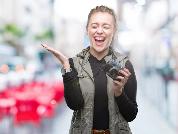 Young Blonde Woman Taking Pictures Using Vintage Camera Isolated Background — Stock Photo, Image