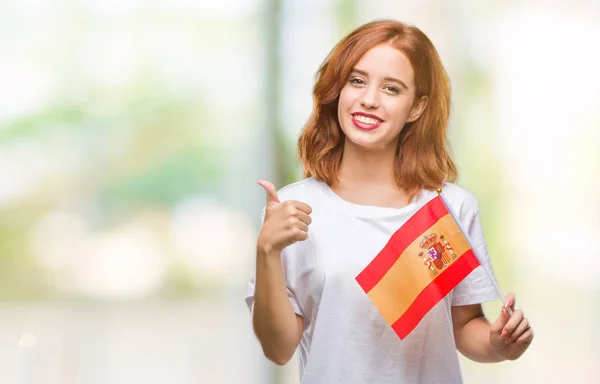 Młoda Piękna Kobieta Trzymając Flagę Hiszpanii Białym Tle Szczęśliwy Uśmiechem — Zdjęcie stockowe
