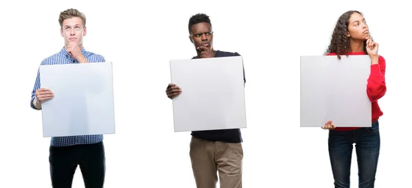 Composition Young People Holding Blank Banner Isolated Background Serious Face — Stock Photo, Image