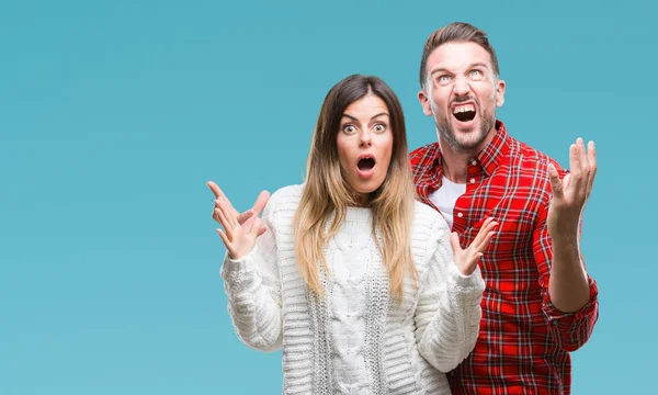 Young Couple Love Wearing Winter Sweater Isolated Background Crazy Mad — Stock Photo, Image