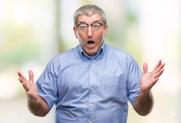 Handsome Senior Man Wearing Glasses Isolated Background Celebrating Crazy Amazed — Stock Photo, Image