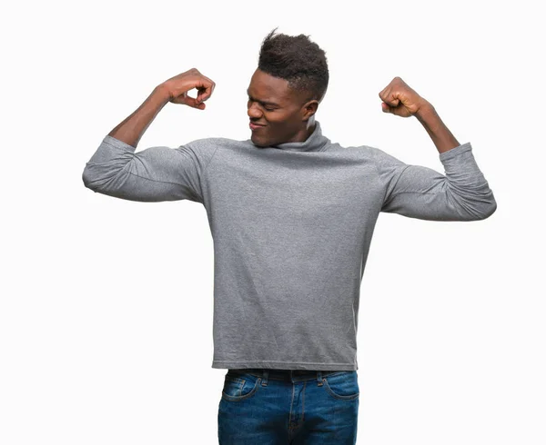 Unga Afroamerikanska Mannen Över Isolerade Bakgrund Visar Armar Muskler Ler — Stockfoto