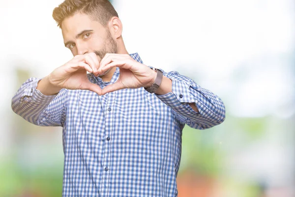 Jovem Homem Bonito Sobre Fundo Isolado Sorrindo Amor Mostrando Símbolo — Fotografia de Stock