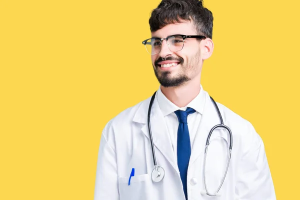 Young Doctor Man Wearing Hospital Coat Isolated Background Looking Away — Stock Photo, Image