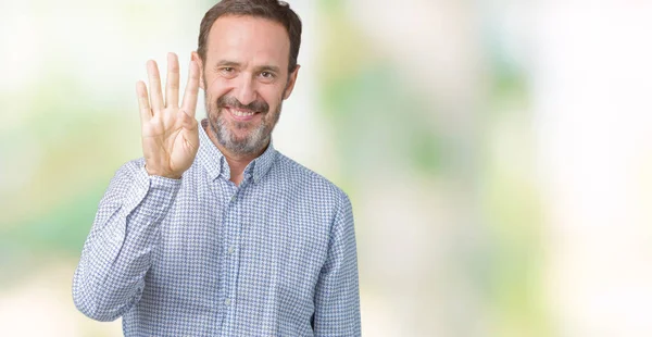 Knappe Middenleeftijd Elegante Senior Man Geïsoleerde Achtergrond Weergeven Met Vingers — Stockfoto