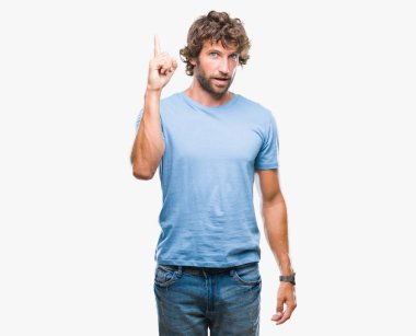 İzole arka plan başarılı fikirle parmak işaret adam yakışıklı İspanyol modeli. Çıktıktan ve mutlu. Bir numara.