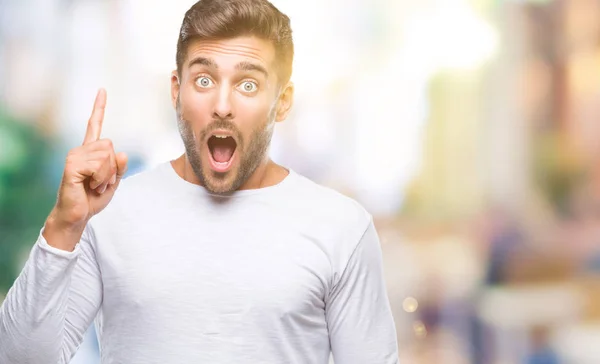 Joven Hombre Guapo Sobre Fondo Aislado Apuntando Con Dedo Hacia —  Fotos de Stock