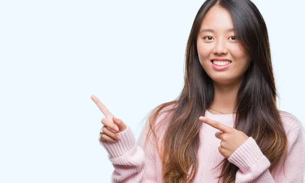 Young Asian Woman Isolated Background Smiling Looking Camera Pointing Two — Stock Photo, Image