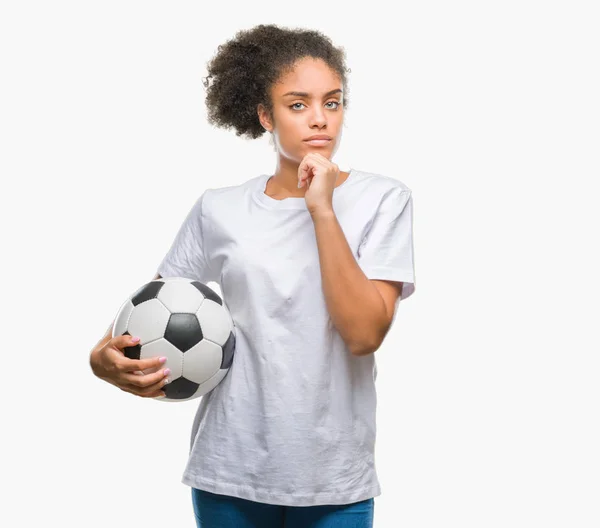 Joven Hermosa Afroamericana Sosteniendo Pelota Fútbol Sobre Fondo Aislado Cara —  Fotos de Stock