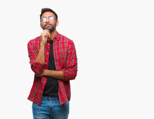 Adult Hispanic Man Wearing Glasses Isolated Background Hand Chin Thinking — Stock Photo, Image
