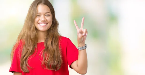 Jonge Mooie Brunette Vrouw Met Rode Shirt Geïsoleerde Achtergrond Weergeven — Stockfoto