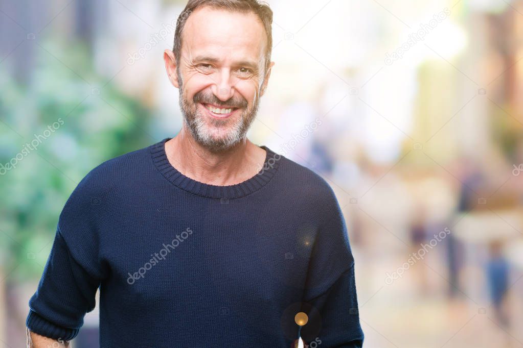 Middle age hoary senior man over isolated background with a happy and cool smile on face. Lucky person.