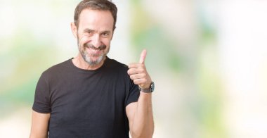 Yakışıklı orta yaş hareketi el ile mutlu yaşasın yapıyor izole arka plan üzerinde ağarmış komuta sizde. Kameraya bakarak başarı gösteren ile ifade onaylama.