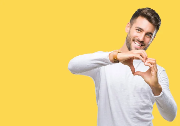 Jovem Homem Bonito Sobre Fundo Isolado Sorrindo Amor Mostrando Símbolo — Fotografia de Stock