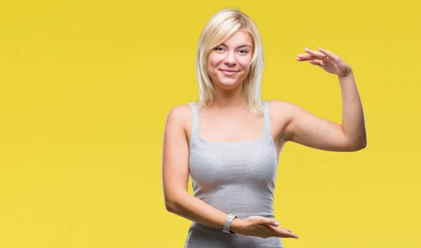 Young Beautiful Blonde Woman Isolated Background Gesturing Hands Showing Big — Stock Photo, Image