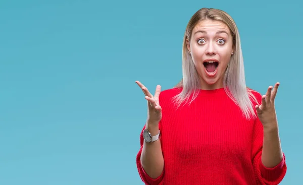 Jovem Loira Vestindo Camisola Inverno Sobre Fundo Isolado Celebrando Louco — Fotografia de Stock