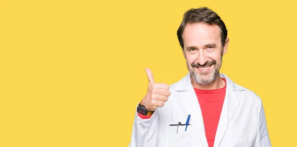Middle Age Therapist Wearing White Coat Doing Happy Thumbs Gesture — Stock Photo, Image