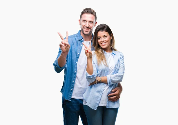 Jovem Casal Apaixonado Sobre Fundo Isolado Sorrindo Com Rosto Feliz — Fotografia de Stock