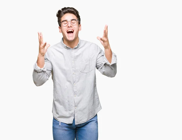 Junger Gutaussehender Mann Mit Brille Vor Isoliertem Hintergrund Der Verrückt — Stockfoto