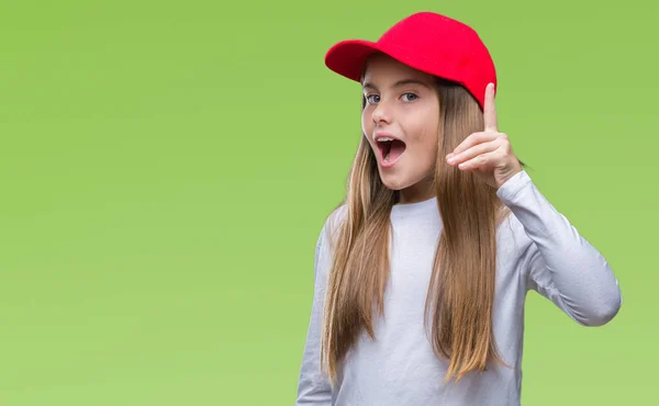 Joven Hermosa Chica Con Gorra Roja Fondo Aislado Señalando Dedo —  Fotos de Stock