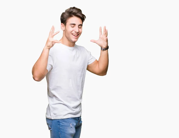 Homem Bonito Jovem Vestindo Shirt Branca Sobre Fundo Isolado Celebrando — Fotografia de Stock