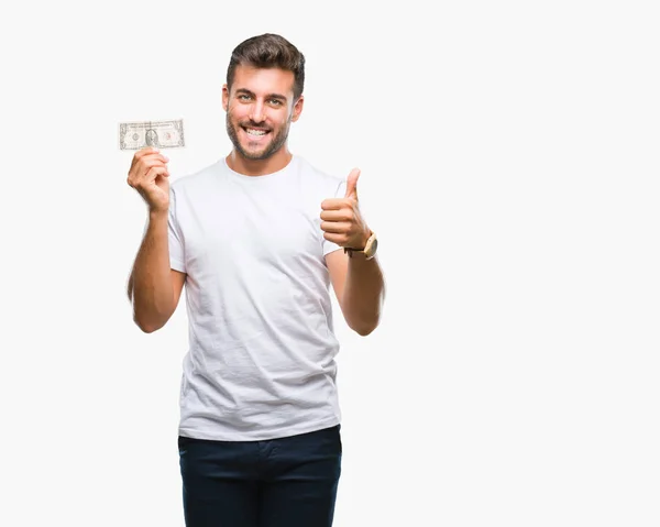 Joven Hombre Guapo Sosteniendo Dólares Sobre Fondo Aislado Feliz Con —  Fotos de Stock