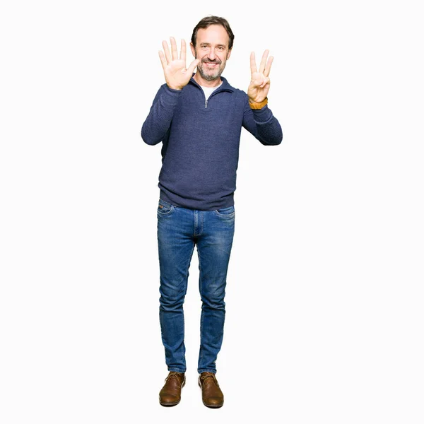 Красивий Чоловік Середнього Віку Одягнений Светр Показує Вказує Пальцями Номер — стокове фото