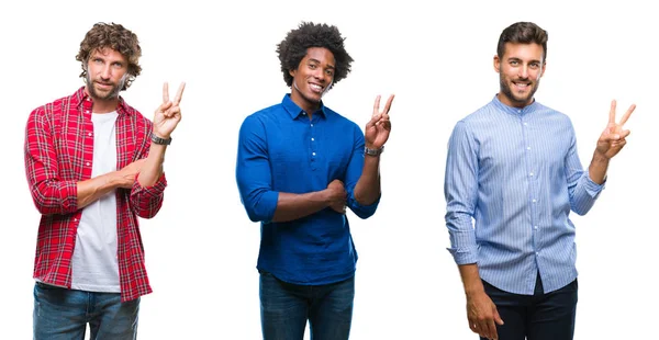 一群非洲裔美国人和西班牙裔男子在孤立的背景微笑着 高兴的脸在镜头里眨眼做胜利的标志 — 图库照片