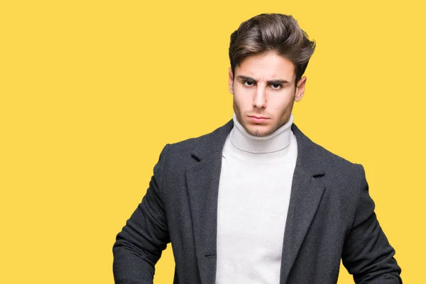 Joven Hombre Elegante Con Abrigo Invierno Sobre Fondo Aislado Escéptico —  Fotos de Stock