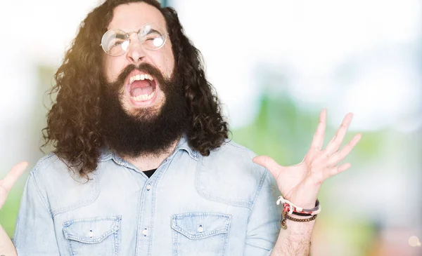 Young Hipster Man Long Hair Beard Wearing Glasses Crazy Mad — Stock Photo, Image