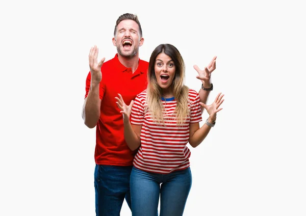 Young Couple Love Isolated Background Celebrating Mad Crazy Success Arms — Stock Photo, Image