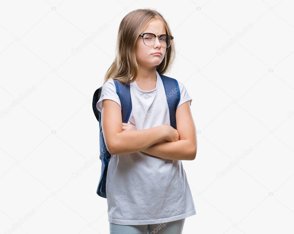 Young beautiful smart student girl wearing backpack over isolated background skeptic and nervous, disapproving expression on face with crossed arms. Negative person.