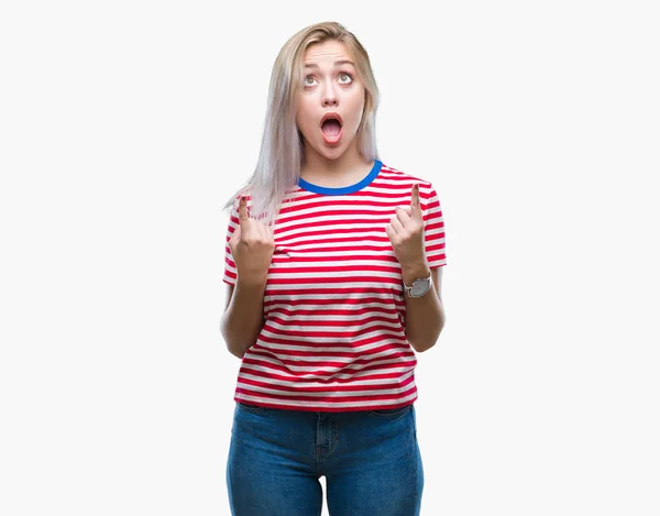 Young Blonde Woman Isolated Background Amazed Surprised Looking Pointing Fingers — Stock Photo, Image