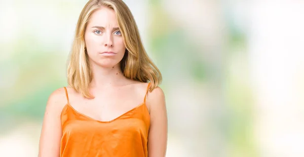 Mulher Bonita Vestindo Camisa Laranja Sobre Fundo Isolado Cético Nervoso — Fotografia de Stock