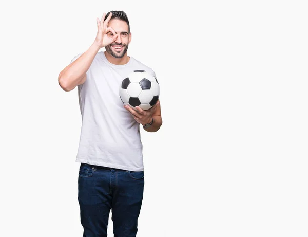 Jovem Segurando Bola Futebol Sobre Fundo Isolado Com Rosto Feliz — Fotografia de Stock