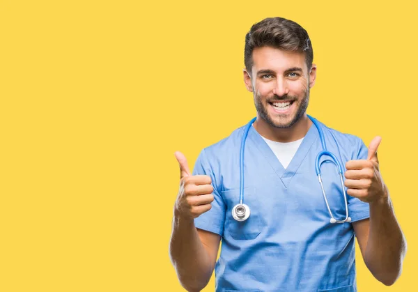 Junge Gut Aussehende Arzt Chirurg Mann Über Isolierten Hintergrund Erfolgszeichen — Stockfoto