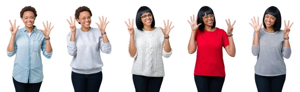 年轻的非洲裔美国妇女与非洲裔头发在孤立的背景显示和指向手指8号 同时微笑自信和快乐 — 图库照片