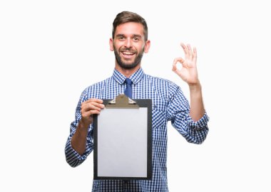 Genç yakışıklı iş adamı holding Pano parmaklar, mükemmel sembolü ile ok işareti yapıyor izole arka plan üzerinde